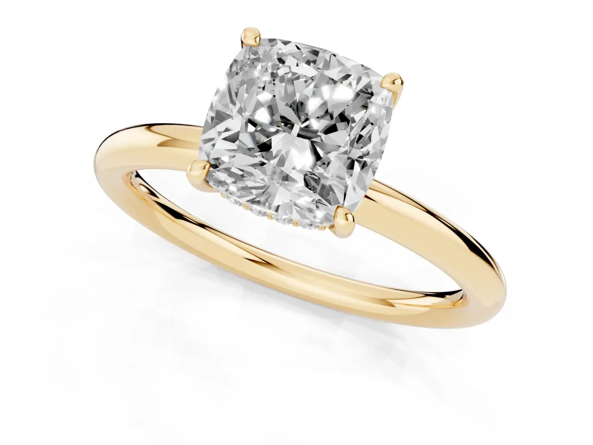 Cushion Cut Diamond Solitaire Ring with Thin Band and Four-Prong Setting Yellow gold