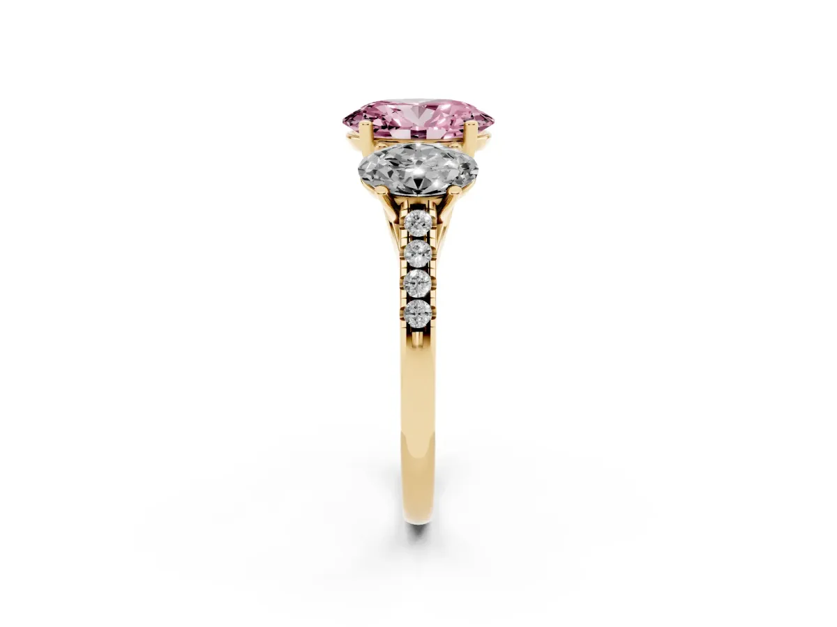 Fancy Pink Three-Stone Oval Cut Diamond Ring with Round Pavé Band and Prong Setting Yellow gold