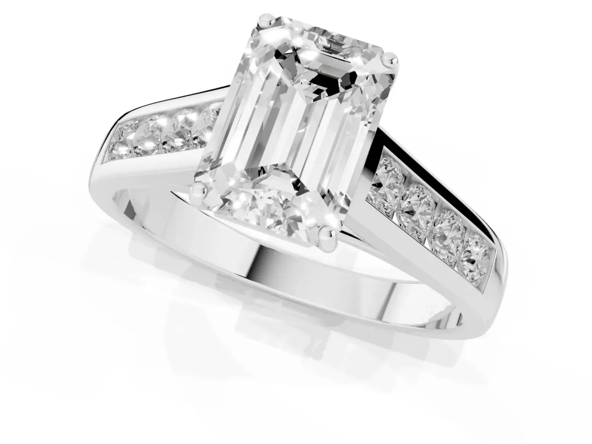 Emerald Cut Brilliant Channel-Set Solitaire Ring with Four-Prong Setting Platinum