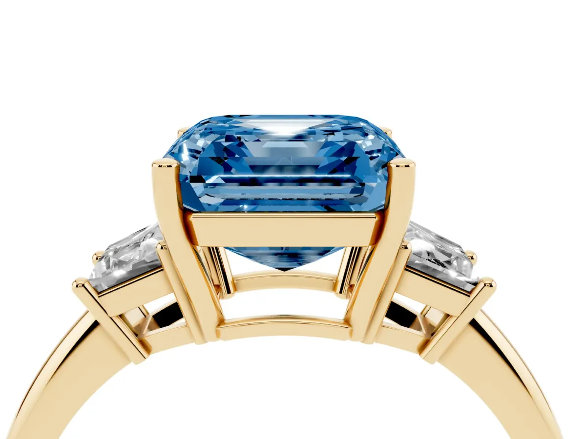 Fancy Blue Asscher Cut Diamond Three-Stone Ring with Trapezoid Side Stones and Prong Setting Yellow gold