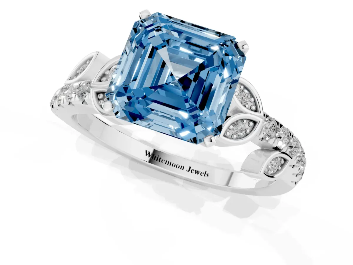 Fancy Blue Asscher Cut Solitaire Leaf-Inspired Diamond Ring with Pavé Band and Four-Prong Setting Silver
