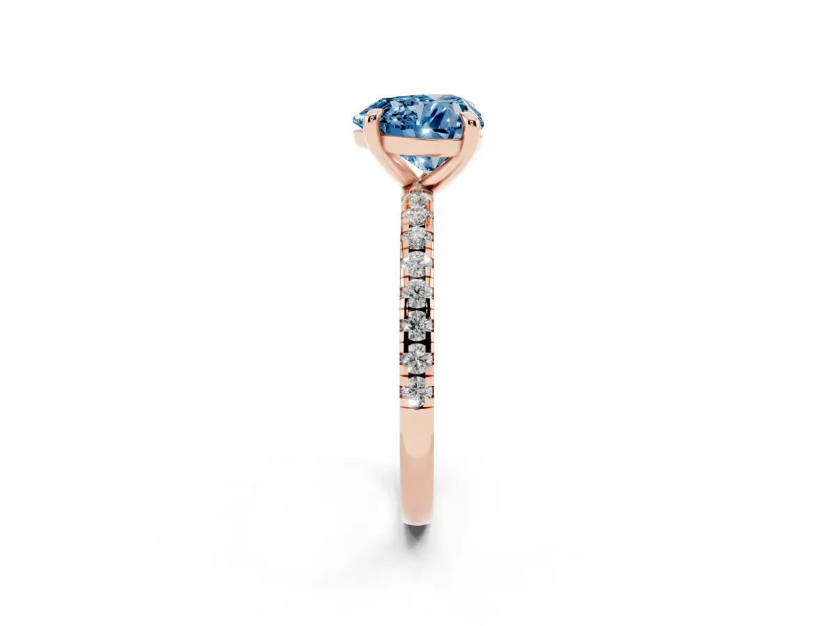 Fancy Blue Heart Cut Diamond Brilliant Solitaire Ring with Pavé Band and Four-Prong Setting Rose gold
