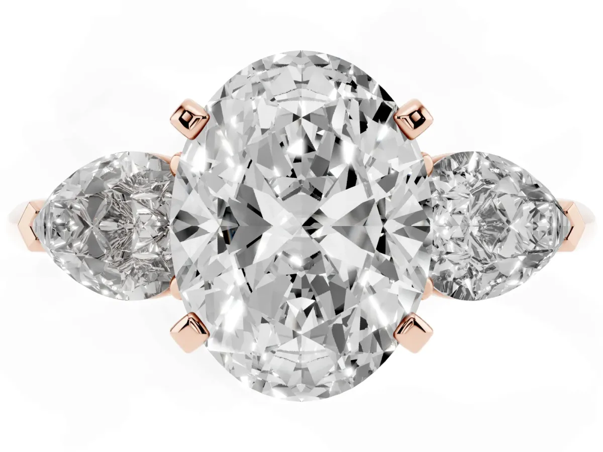 Three-Stone Oval Cut Diamond Ring with Pear Side Stones and Four-Prong Setting Rose gold