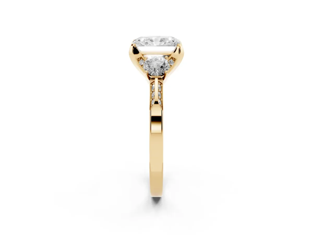 Radiant Cut Brilliant Three-Stone Diamond Ring with Pavé Band and Four-Prong Setting Yellow gold