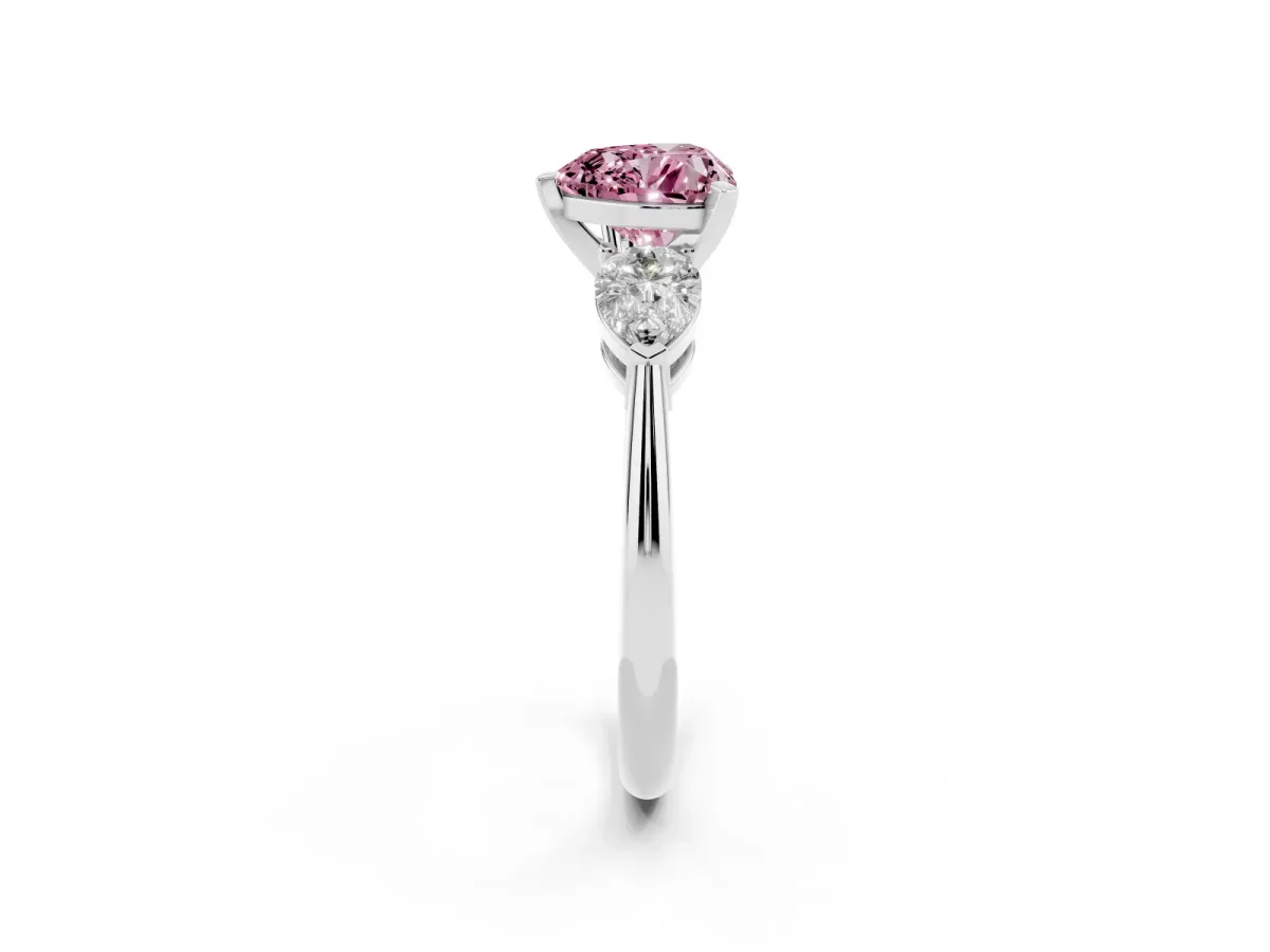 Fancy Pink Three-Stone Heart Cut Diamond Ring with Pear Side Stones and Four-Prong Setting Silver
