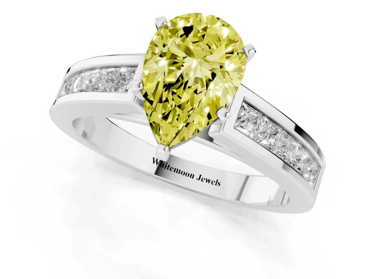 Fancy Yellow Pear Cut Solitaire Diamond Ring with Channel-Set Band and Four-Prong Setting Silver