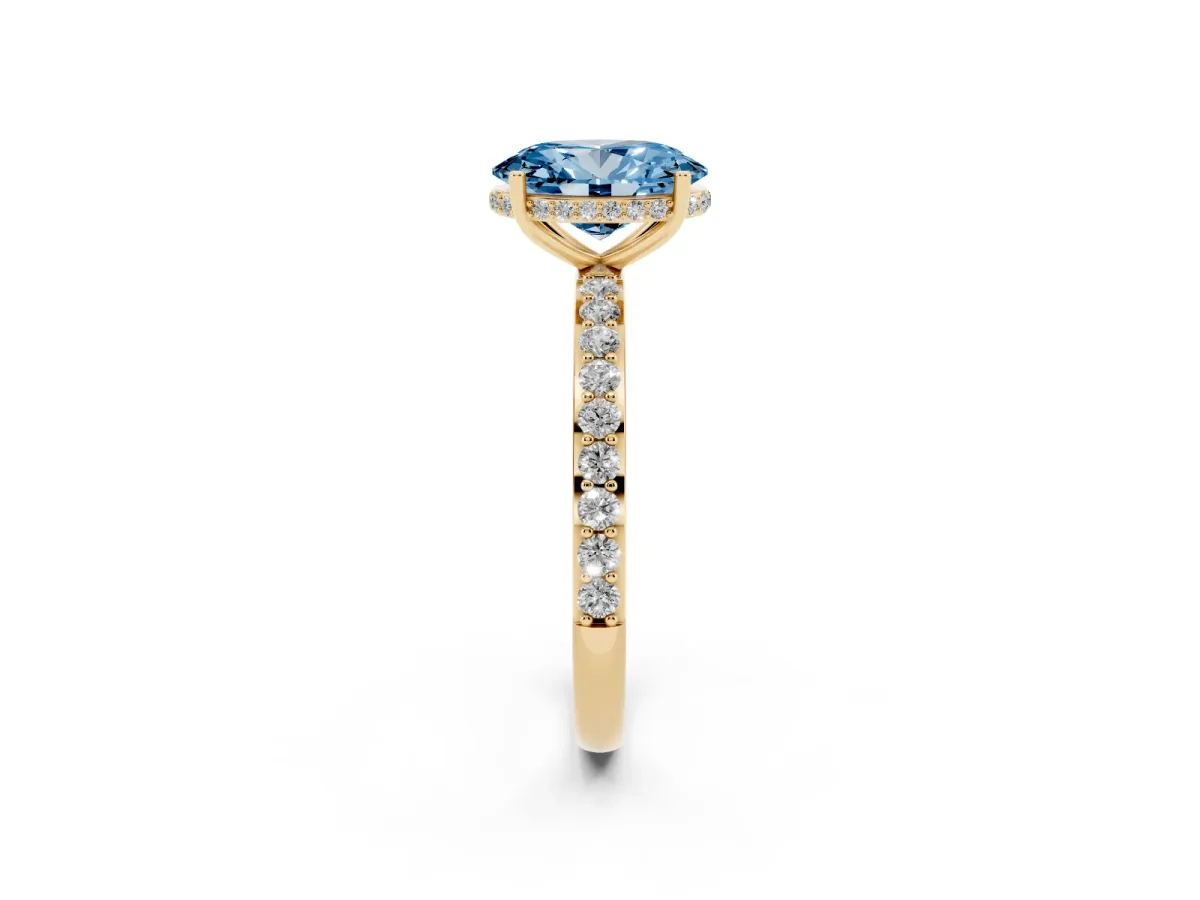 Fancy Blue Oval Cut Diamond Solitaire Ring with Pavé Band and Hidden Halo Yellow gold