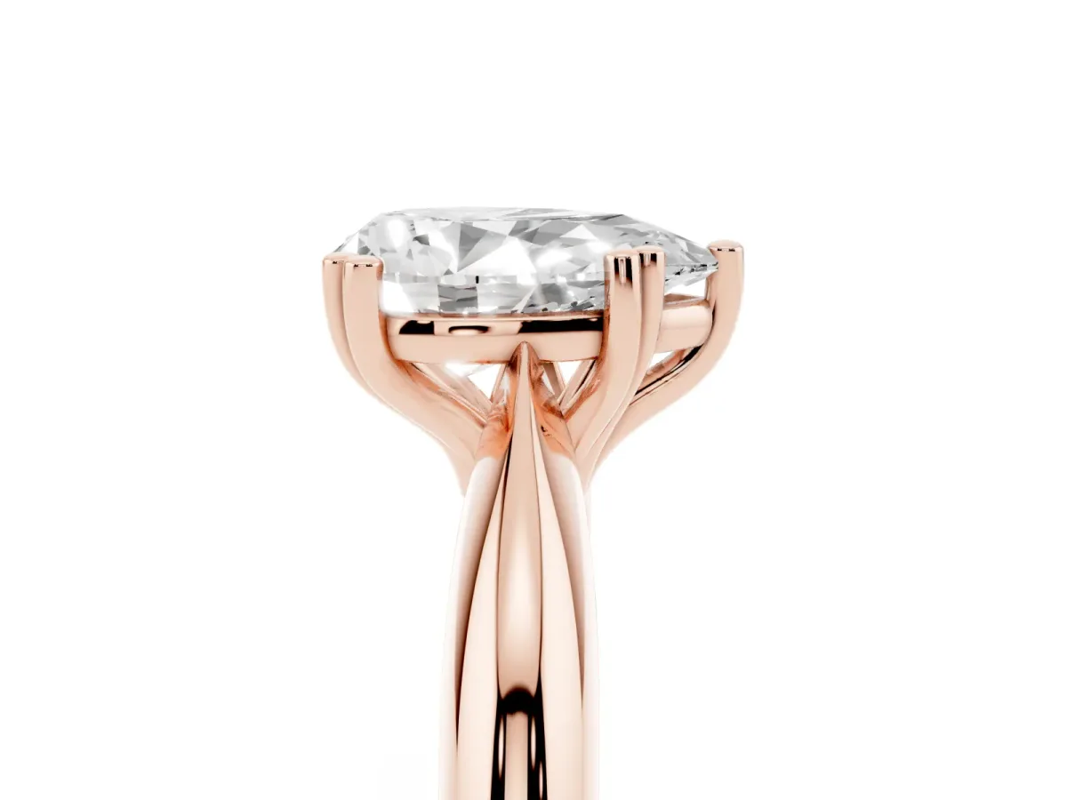 Pear Cut Cut Solitaire Engagement Ring with Tapered Band and Four-Prong Setting Rose gold