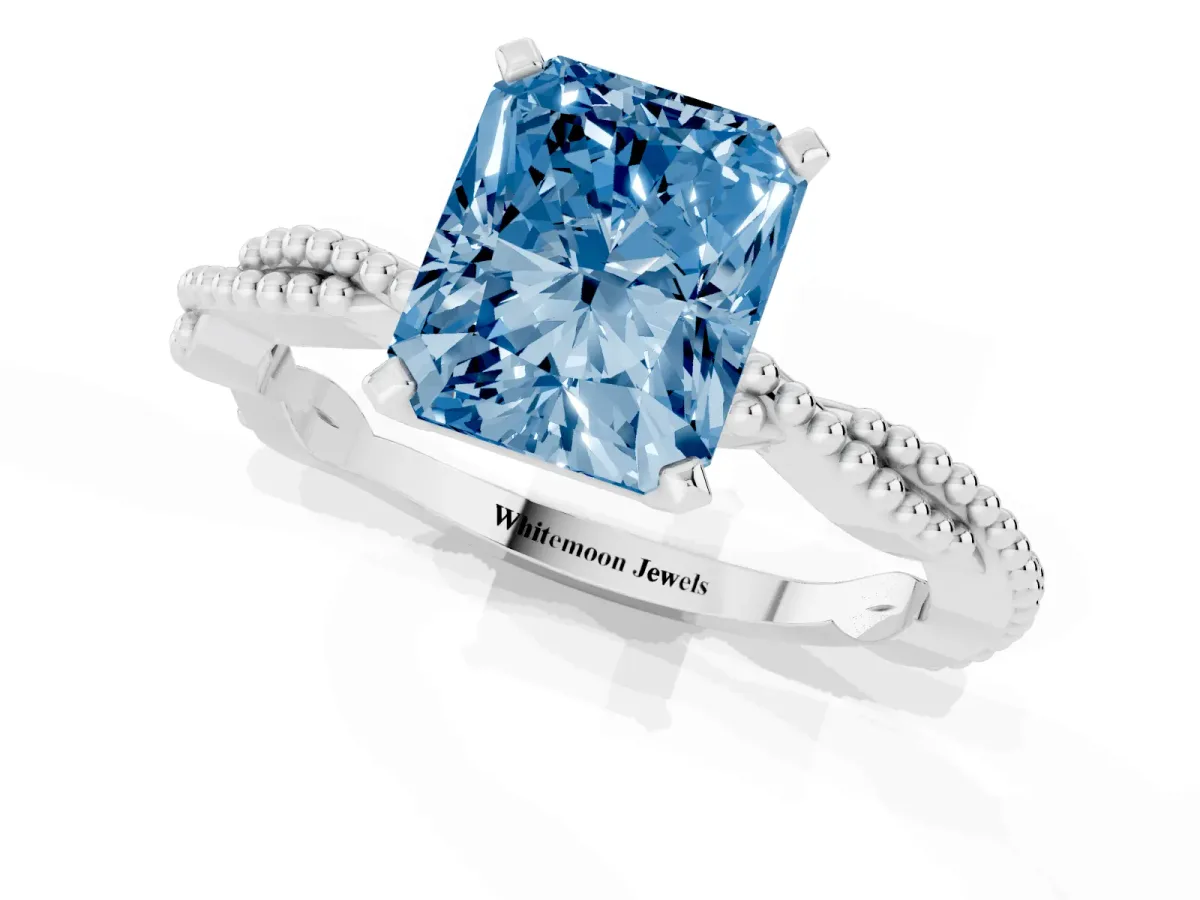 Fancy Blue Radiant Cut Solitaire Twisted Band with Bead Prong Setting Platinum