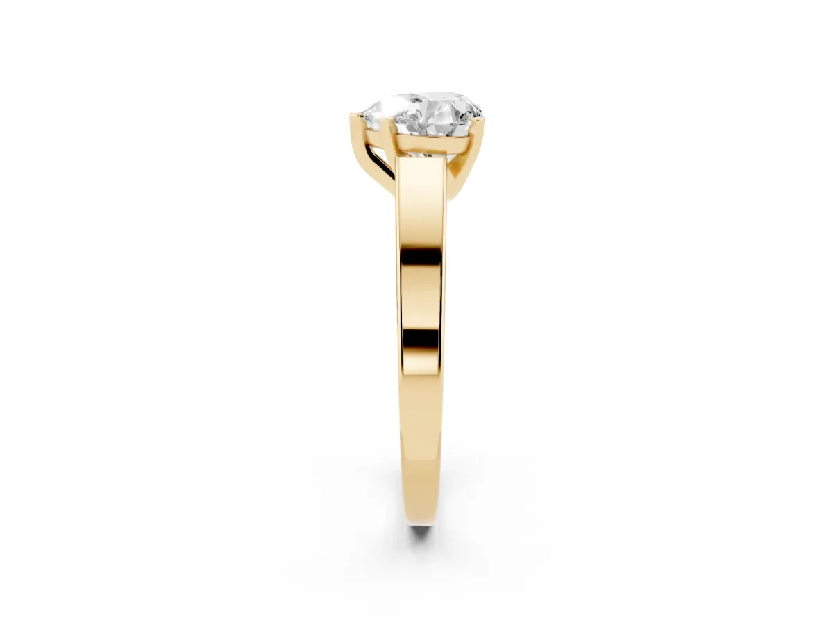 Heart Cut Solitaire Engagement Ring with Four-Prong Setting and Tapered Band Yellow gold