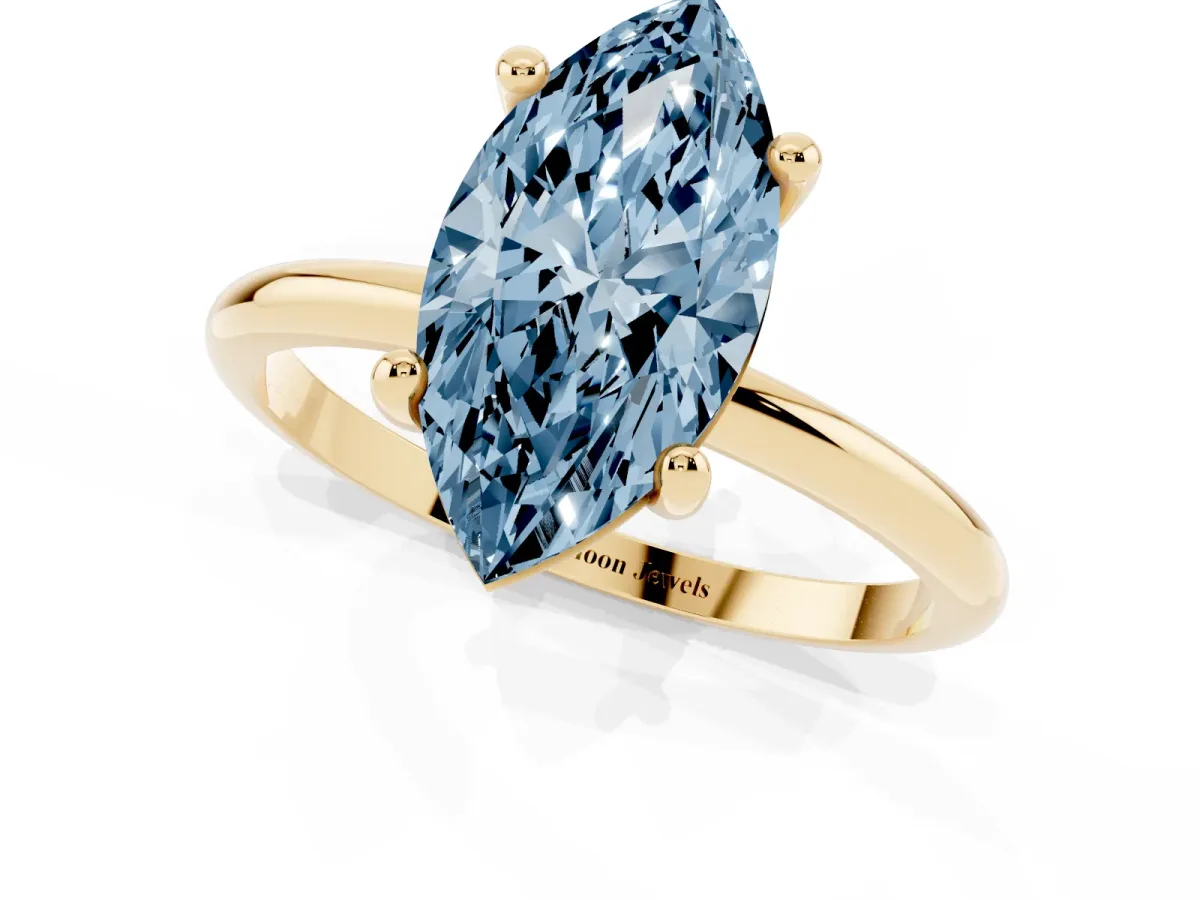 Fancy Blue Marquise Cut Solitaire Diamond Ring with 4-Prong Setting on a Classic Band Yellow gold