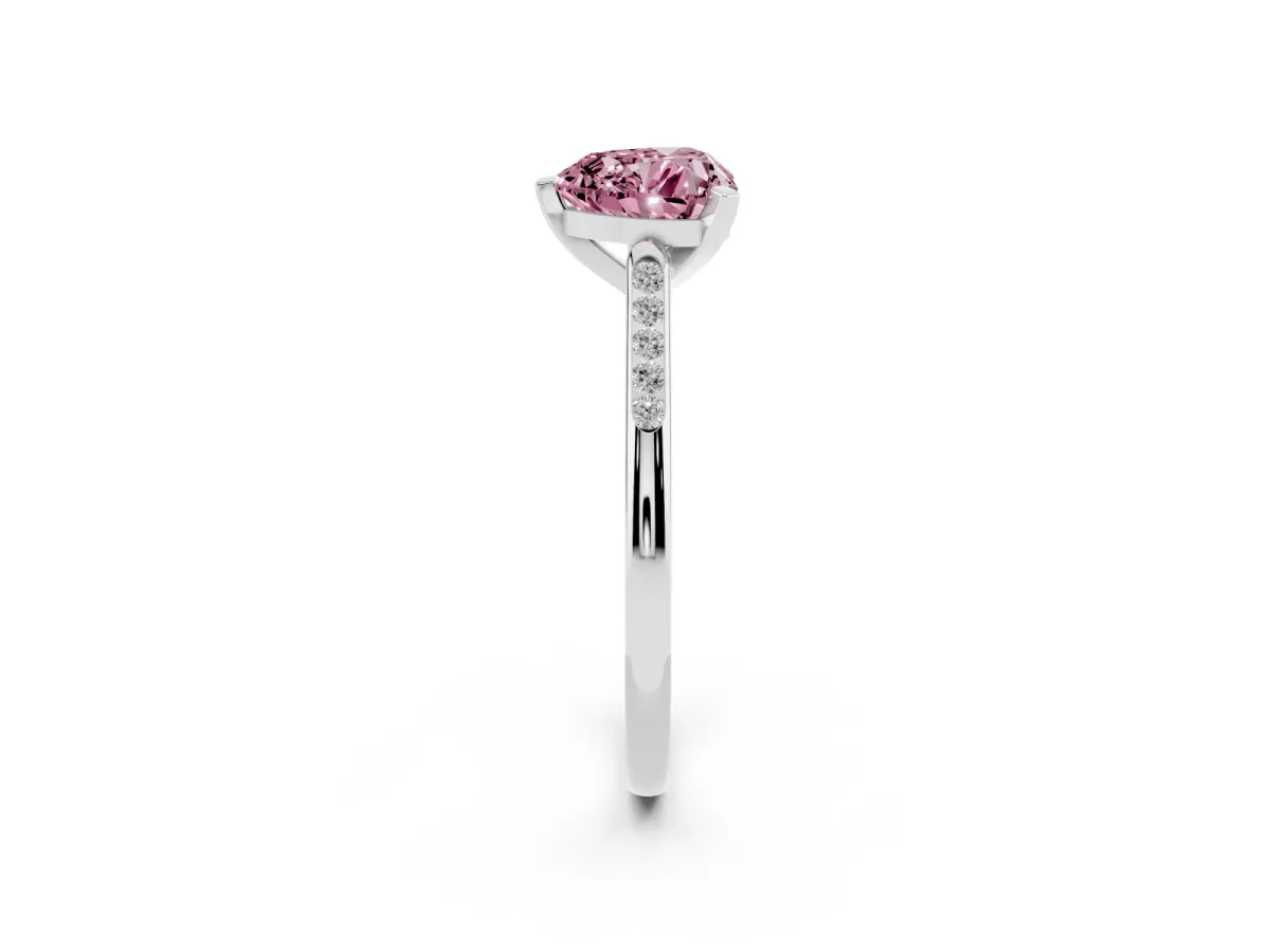 Fancy Pink Heart Cut Diamond Solitaire Ring with Channel Set Round Band and Prong Setting Silver