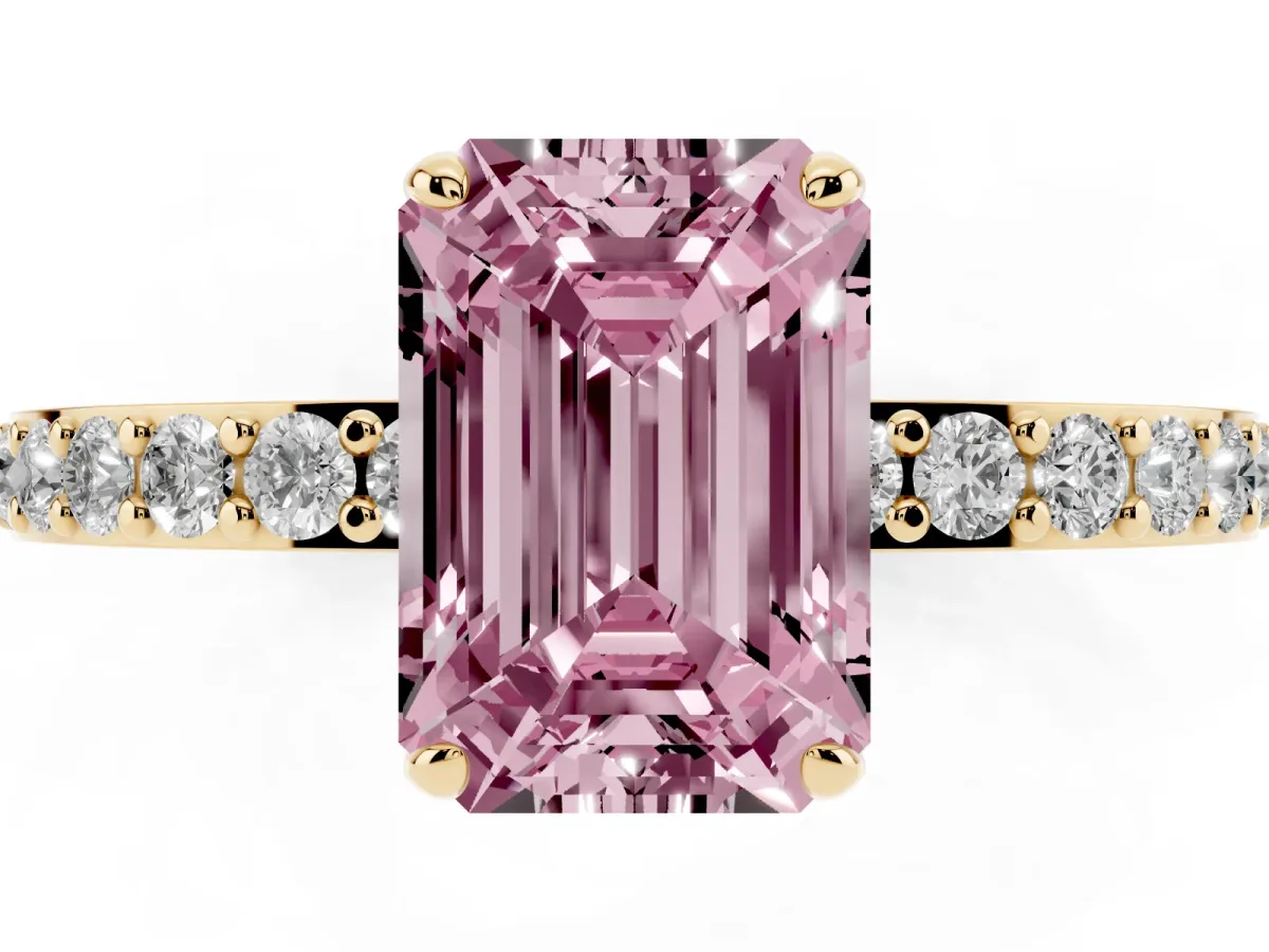 Fancy Pink Emerald Cut Diamond Pavé Engagement Ring with Round Accents and Prong Setting Yellow gold