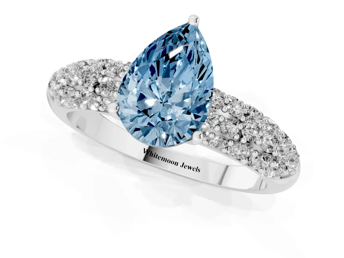 Fancy Blue Pear Cut Diamond Pavé Band Solitaire Ring with Four-Prong Setting Silver