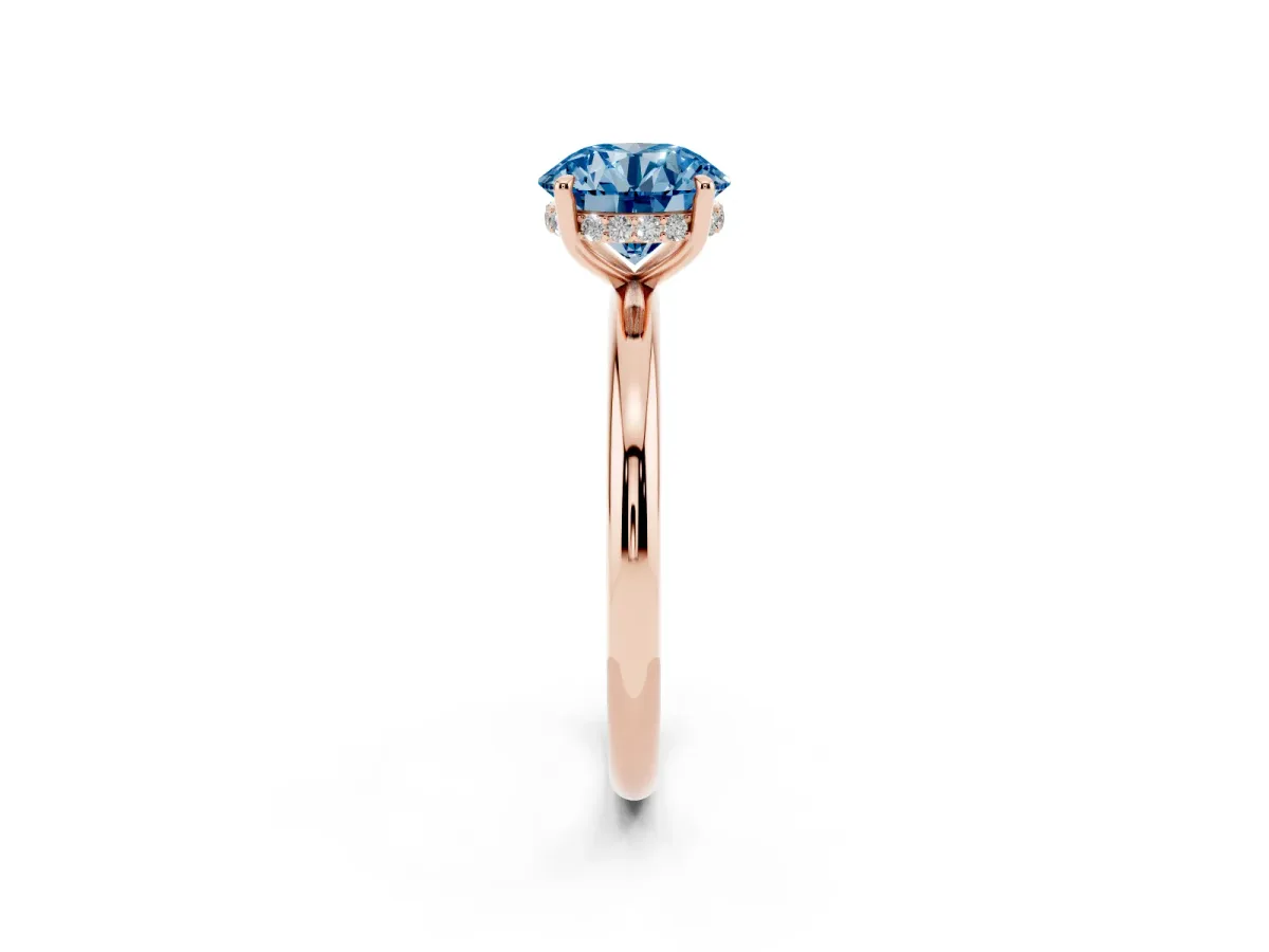 Fancy Blue Round Cut Diamond Solitaire Ring with Thin Band and Four-Prong Setting Rose gold
