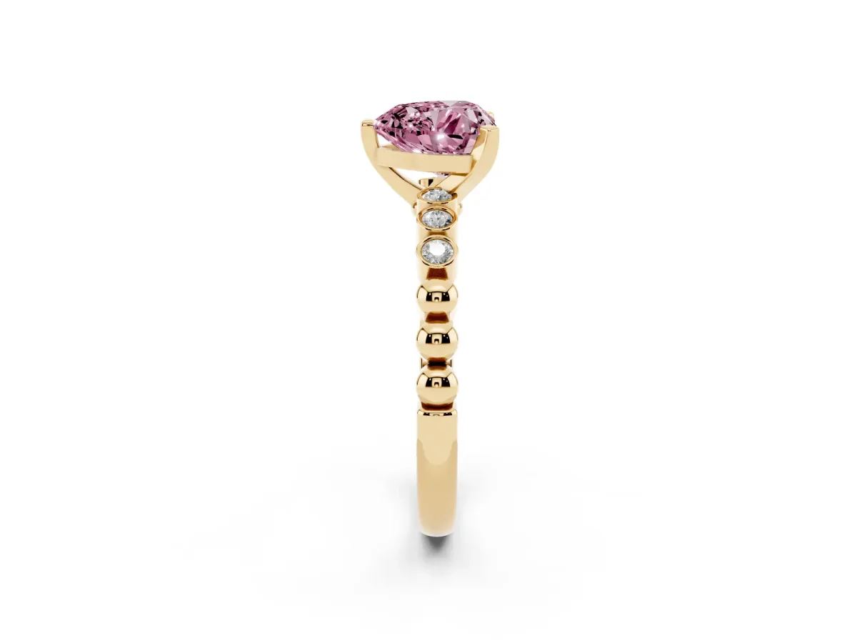Fancy Pink Heart Cut Solitaire Bezel Accent Diamond Engagement Ring with Beaded Band and Four-Prong Setting Yellow gold
