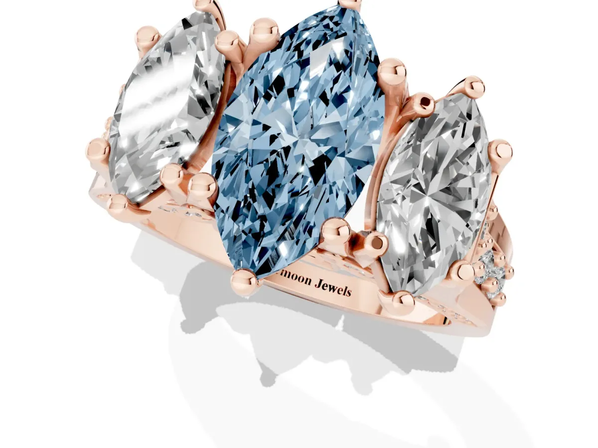 Fancy Blue Marquise Cut Diamond Three-Stone Ring with Channel Set Band and Four-Prong Setting Rose gold