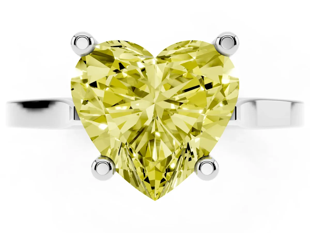 Fancy Yellow Heart Cut Solitaire Diamond Ring with Four-Prong Setting and Tapered Band Silver