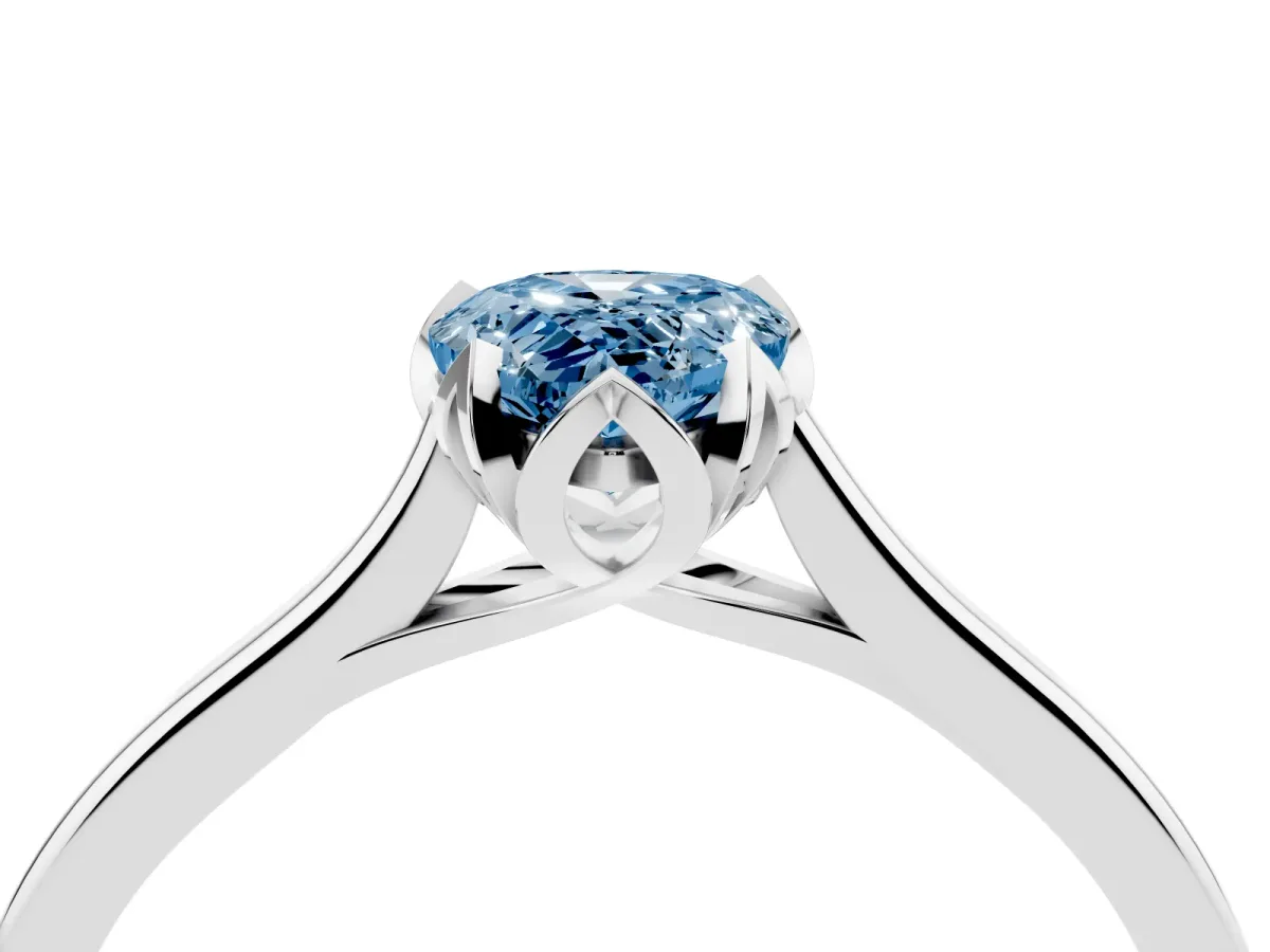 Fancy Blue Pear Cut Diamond Solitaire Ring with Flower Prong Setting and Classic Band Platinum