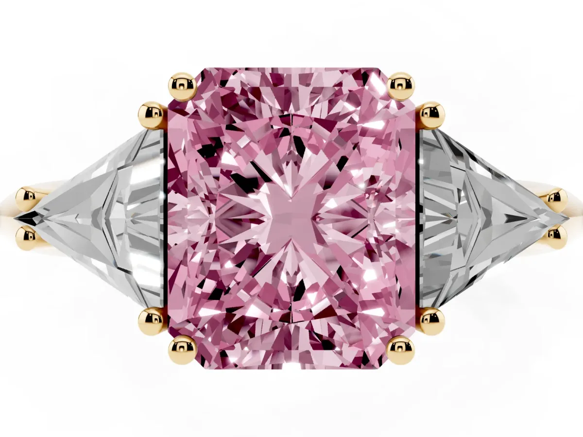 Fancy Pink Three-Stone Radiant Cut Diamond Engagement Ring with Trillion Side Stones and Prong Setting Yellow gold