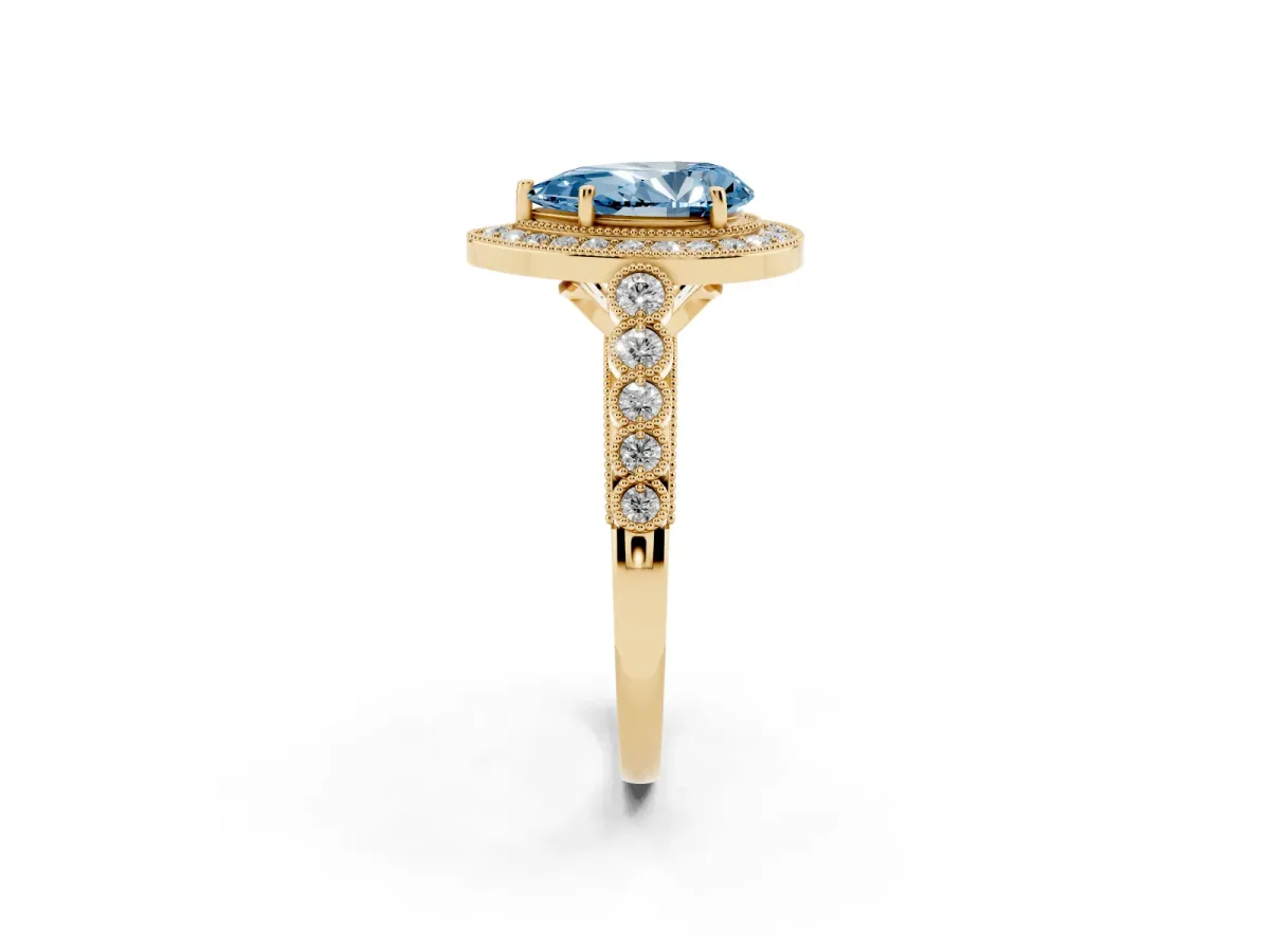 Fancy Blue Pear Cut Halo Milgrain Solitaire with Bezel Set Side Stones and Pave Band Yellow gold