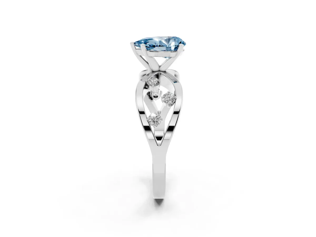 Fancy Blue Pear Cut Cut Solitaire Diamond with Side Stones on Criss-Cross Band and Four-Prong Setting Silver