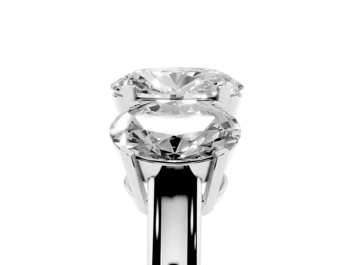 Three-Stone Oval Cut Cut Diamond Ring with Channel Set Band and Four-Prong Setting Silver