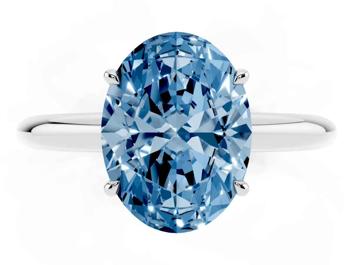 Fancy Blue Oval Cut Brilliant Solitaire Engagement Ring with Six-Prong Setting and Classic Band White gold