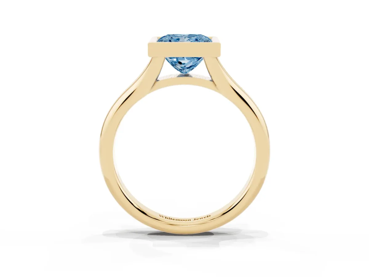 Fancy Blue Bezel Set Princess Cut Solitaire Diamond Ring with Smooth Band Yellow gold