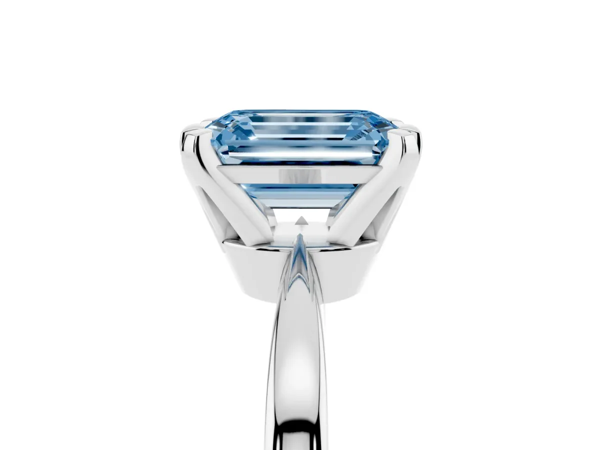 Fancy Blue Emerald Cut Solitaire Engagement Ring with Six-Prong Setting and Tapered Band Silver