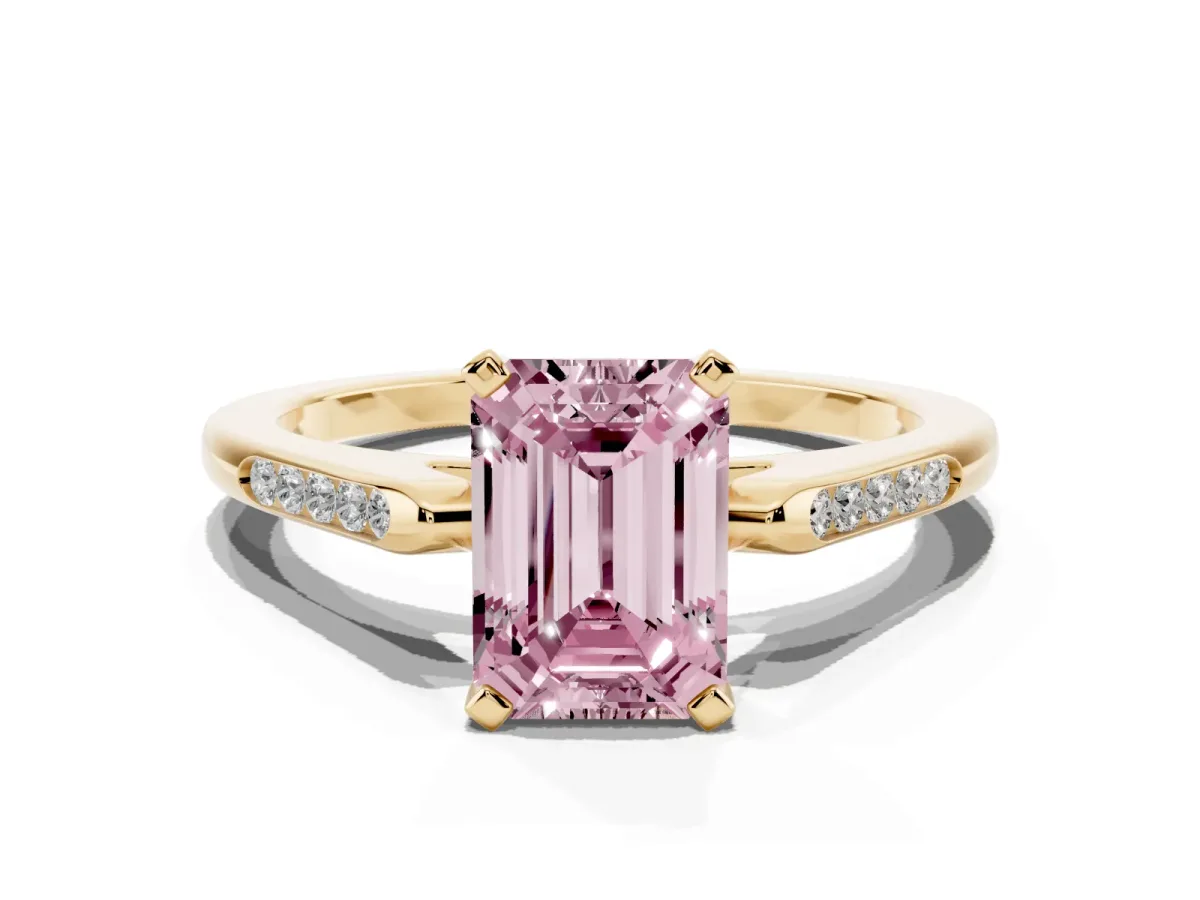 Fancy Pink Emerald Cut Diamond Solitaire Ring with Channel Set Round Band and Prong Setting Yellow gold