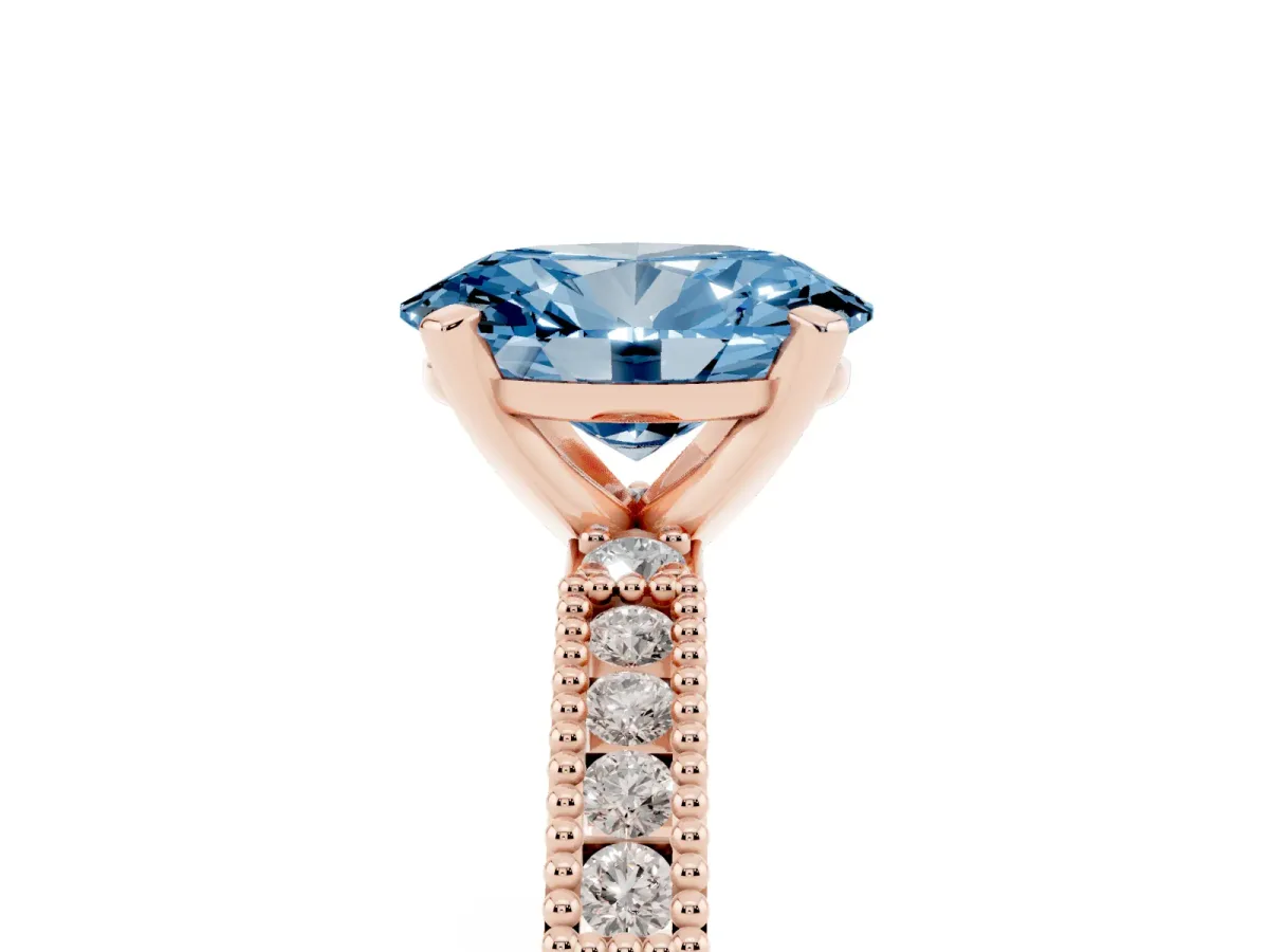 Fancy Blue Oval Cut Solitaire with Pavé Band and Four-Prong Setting Rose gold