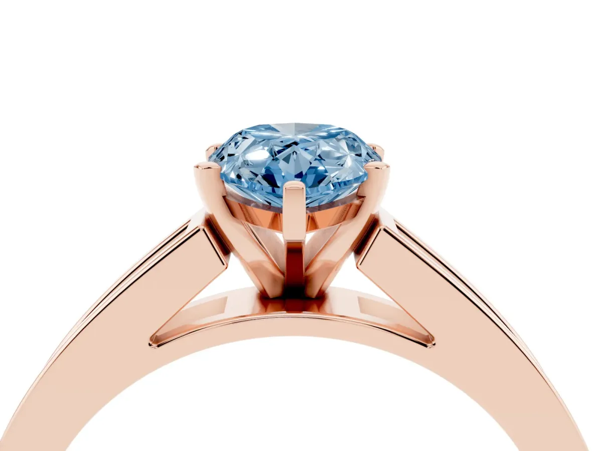 Fancy Blue Pear Cut Solitaire Diamond Ring with Channel-Set Band and Four-Prong Setting Rose gold
