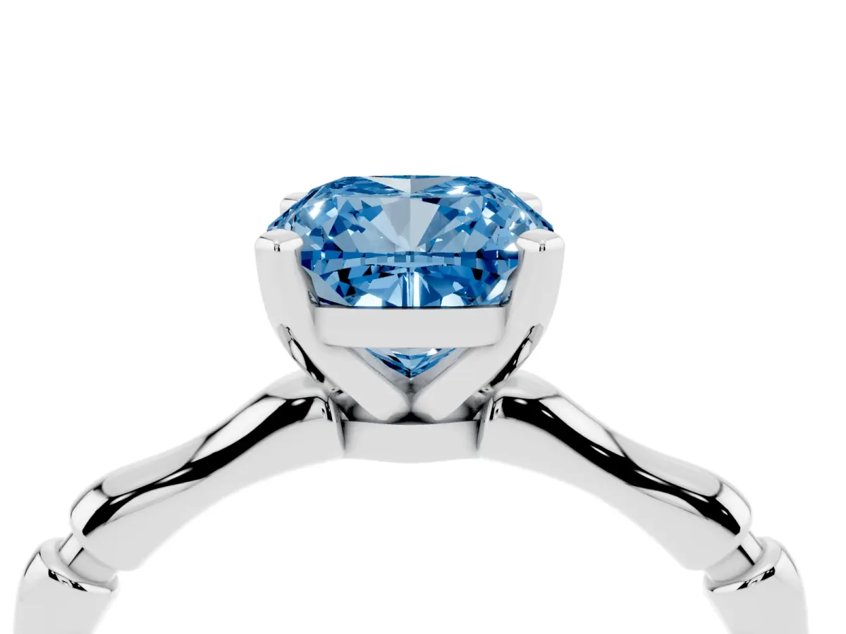 Fancy Blue Cushion Cut Solitaire Diamond Ring with Bamboo Band and Four-Prong Setting Silver