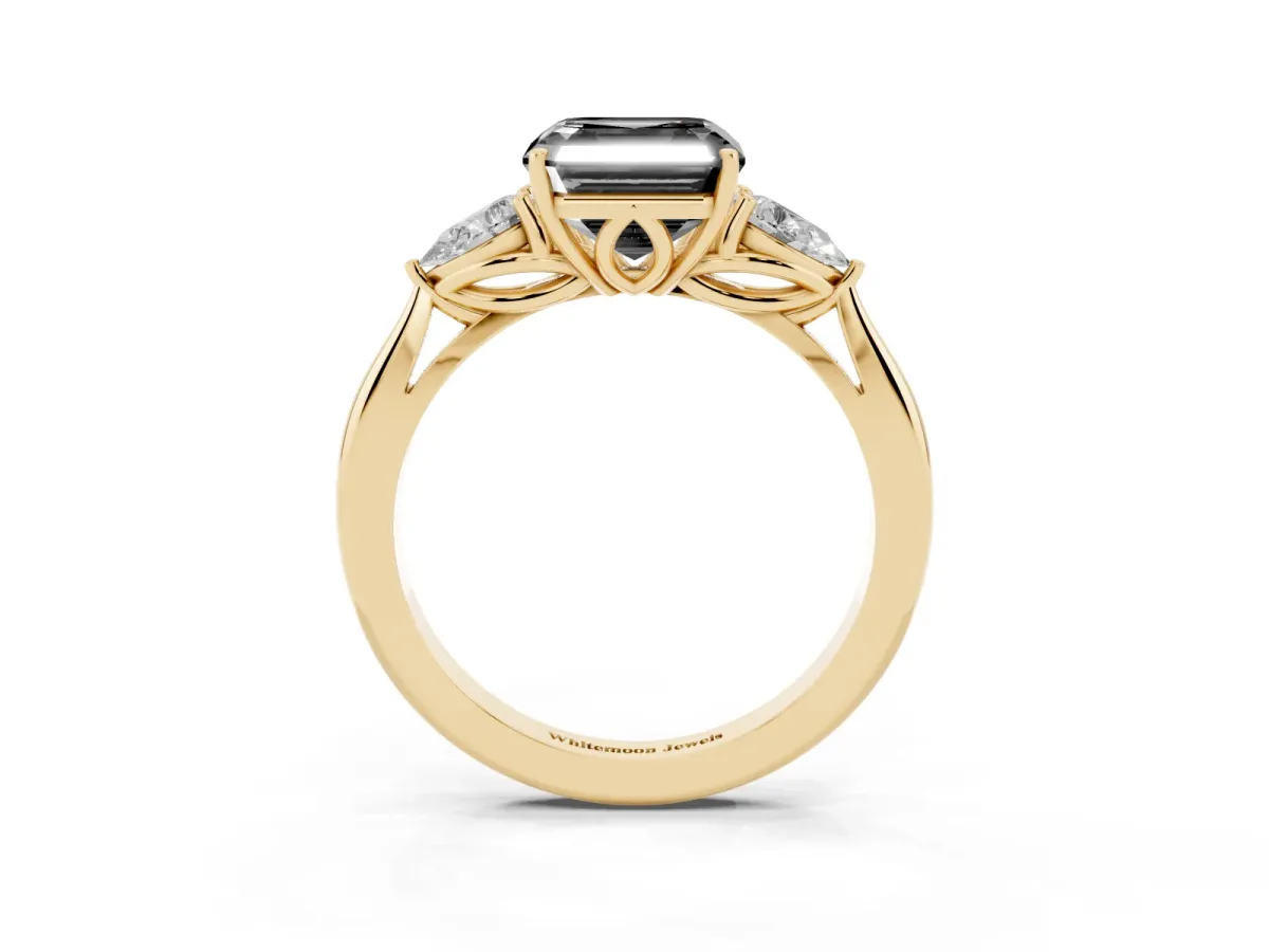 Fancy Black Asscher Cut Diamond Three-Stone Ring with Pear Side Stones and Prong Setting Yellow gold