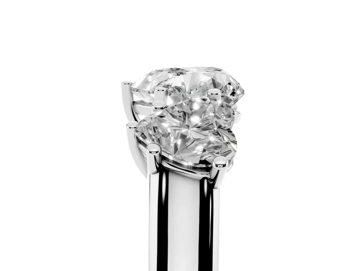 Heart Cut Three-Stone Diamond Ring with Prong Setting on a Classic Band White gold