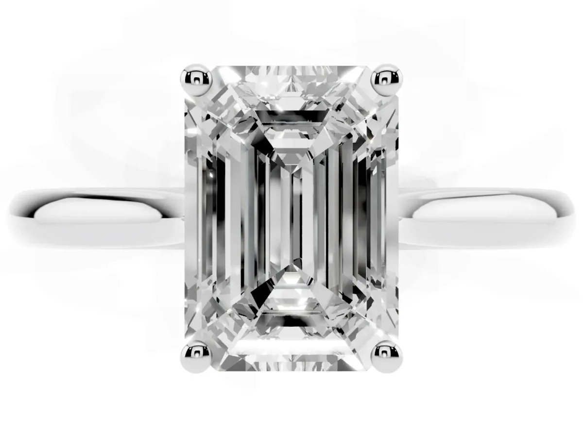 Emerald Cut Cut Solitaire Ring with Cathedral Band and Four-Prong Setting Silver