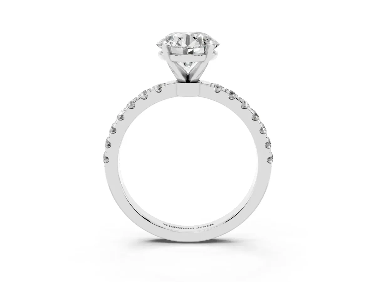 Round Cut Diamond Solitaire Ring with Pavé Accents and Four-Prong Setting Silver