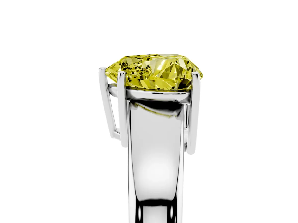 Fancy Yellow Heart Cut Solitaire Diamond Ring with Tapered Band and Four-Prong Setting Silver