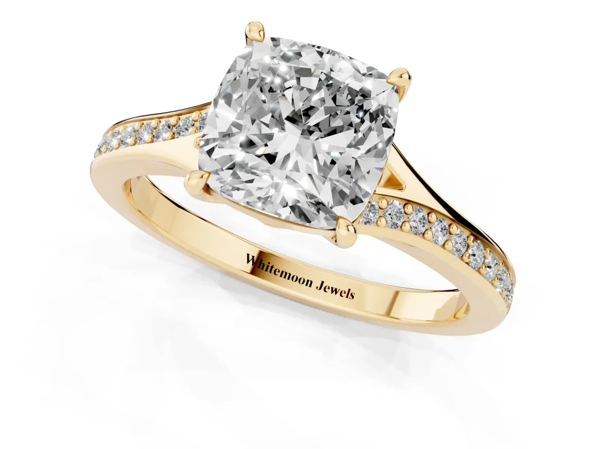 Cushion Cut Diamond Solitaire Ring with Pavé Band and Prong Setting Yellow gold