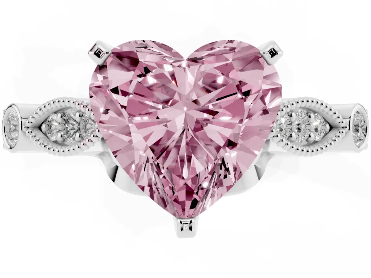 Fancy Pink Heart Cut Cut Diamond with Milgrain Marquise and Bezel Accents on a Solitaire Band with Prong Setting Platinum