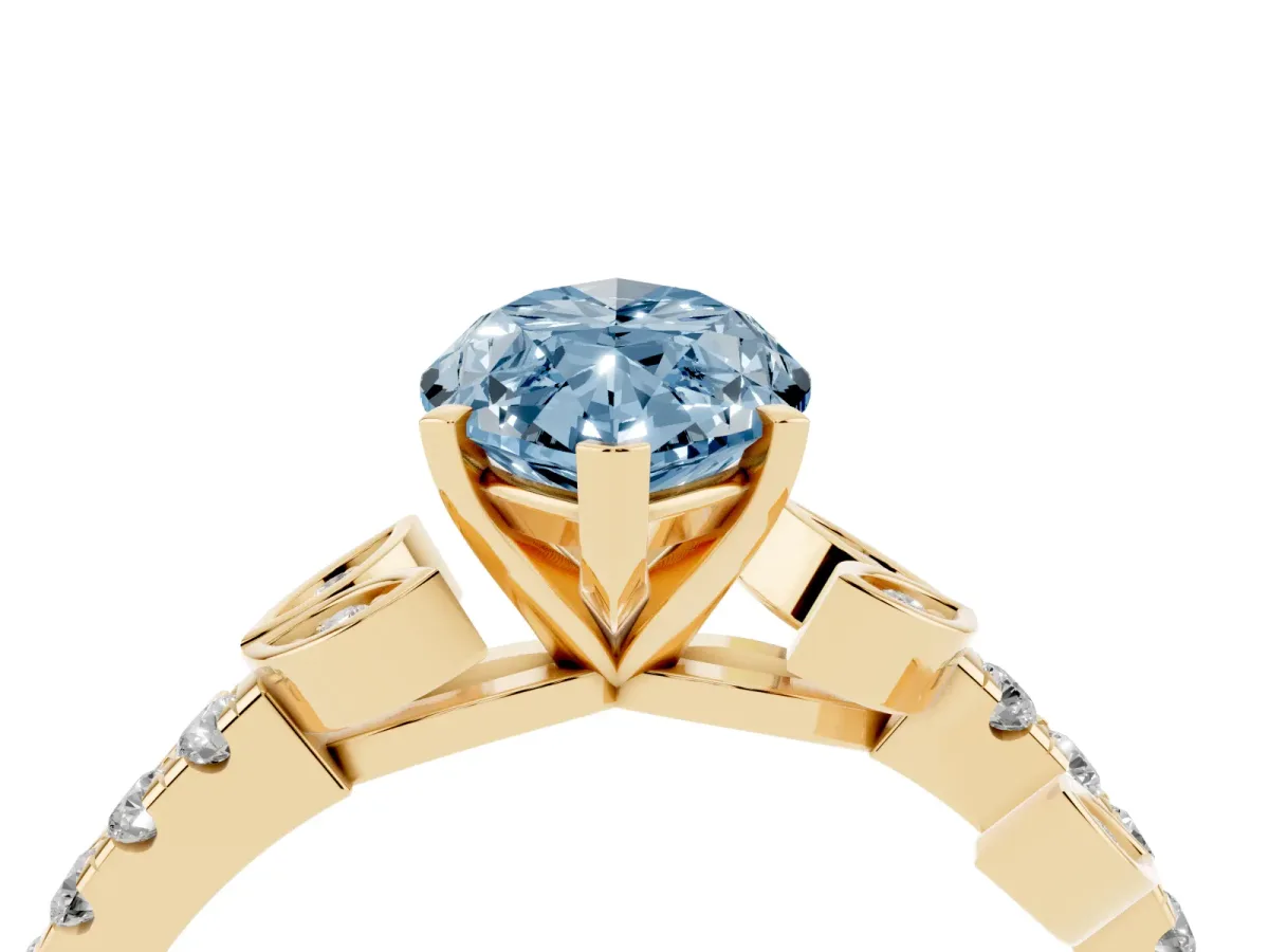 Fancy Blue Marquise Cut Solitaire Leaf-Inspired Diamond Ring with Pavé Band and Four-Prong Setting Yellow gold