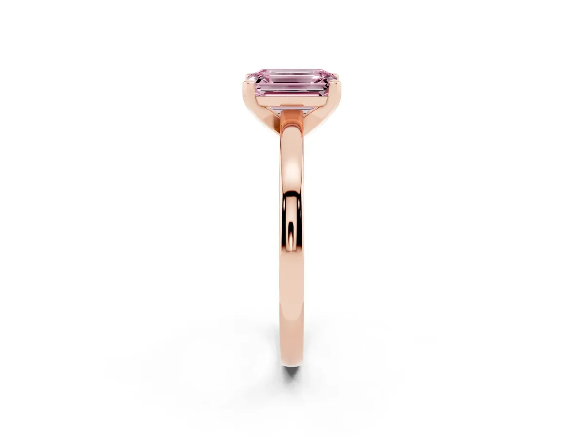 Fancy Pink Emerald Cut Solitaire Diamond Engagement Ring with Four-Prong Setting on a Classic Band Rose gold