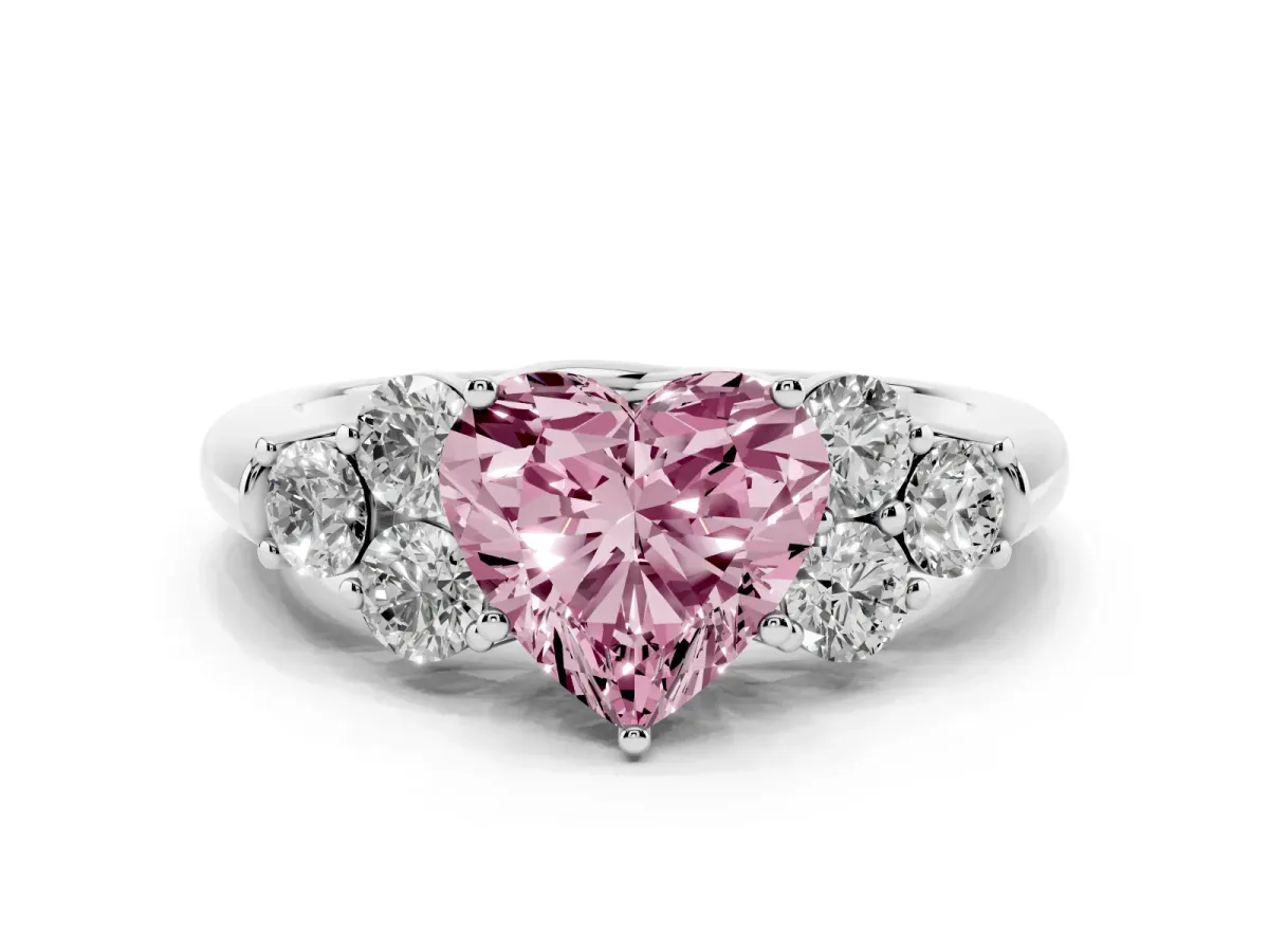 Fancy Pink Heart Cut Cut Diamond Cluster Ring with Round Accent Stones and Prong Setting on a Classic Band White gold