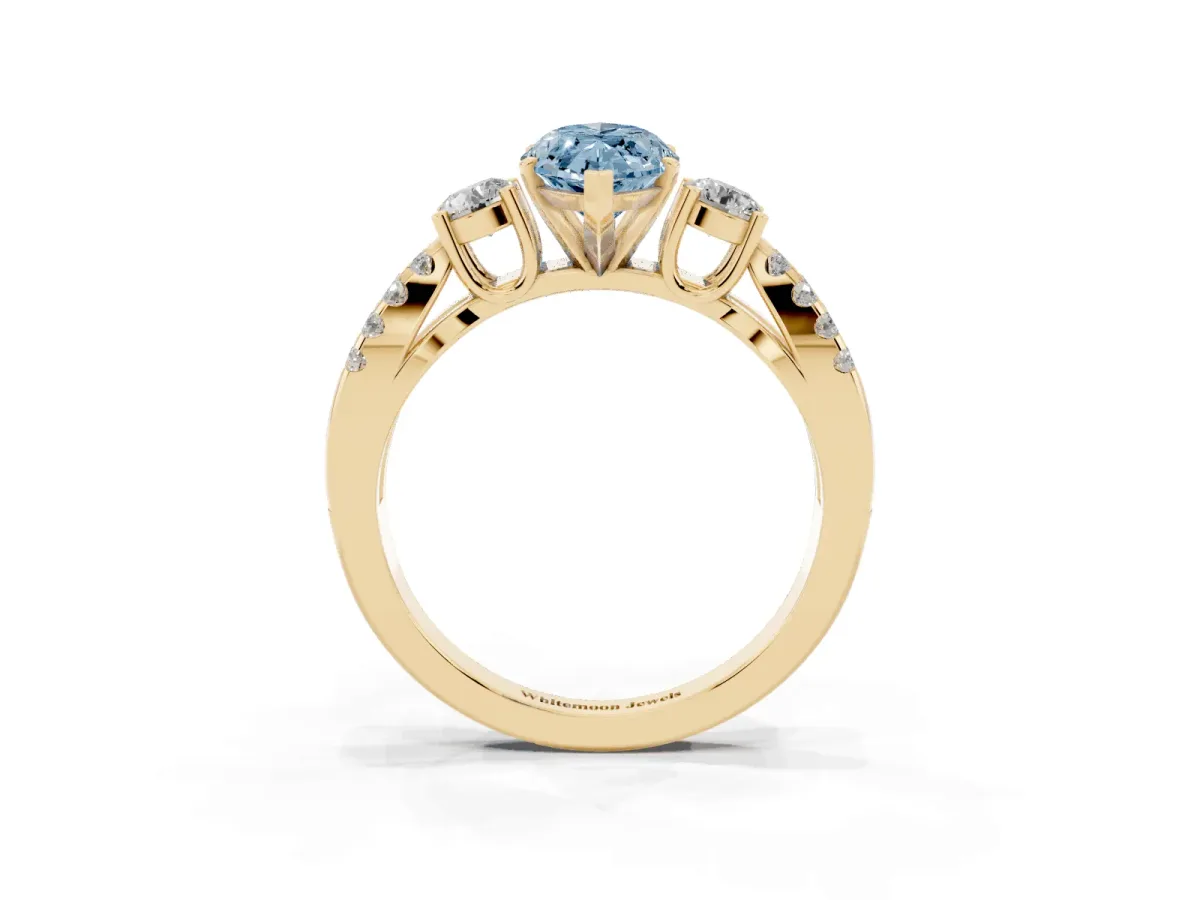 Fancy Blue Marquise Cut Diamond Three-Stone Ring with Pavé Split Shank and Four-Prong Setting Yellow gold