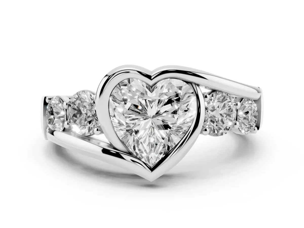 Bezel Set Heart Cut Diamond Bypass Ring with Round Accents Platinum