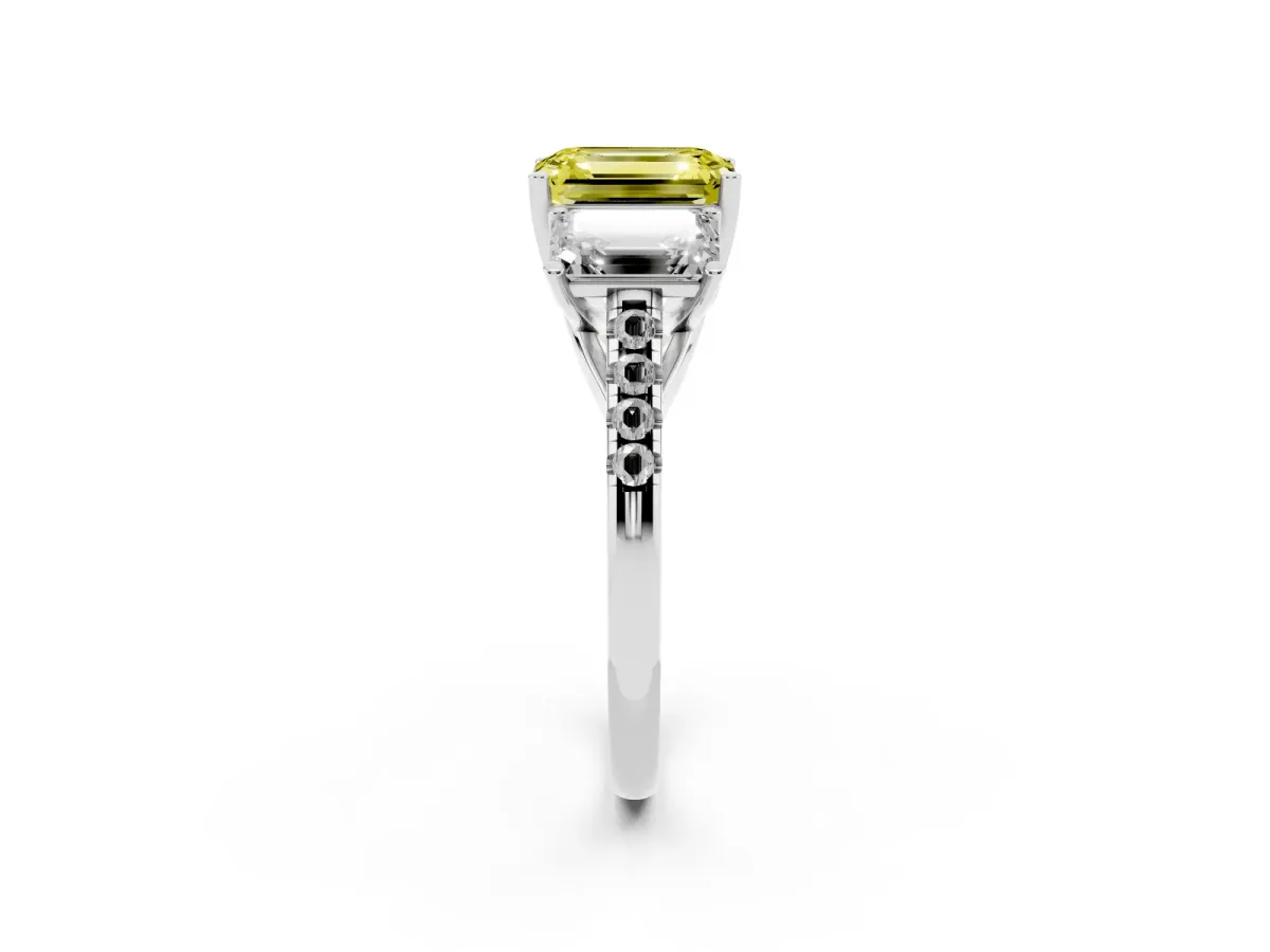Fancy Yellow Three-Stone Emerald Cut Diamond Ring with Round Pavé Band and Prong Setting Silver