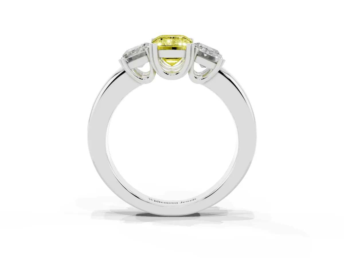 Fancy Yellow Three-Stone Emerald Cut Cut Diamond Ring with Channel Set Band and Four-Prong Setting White gold