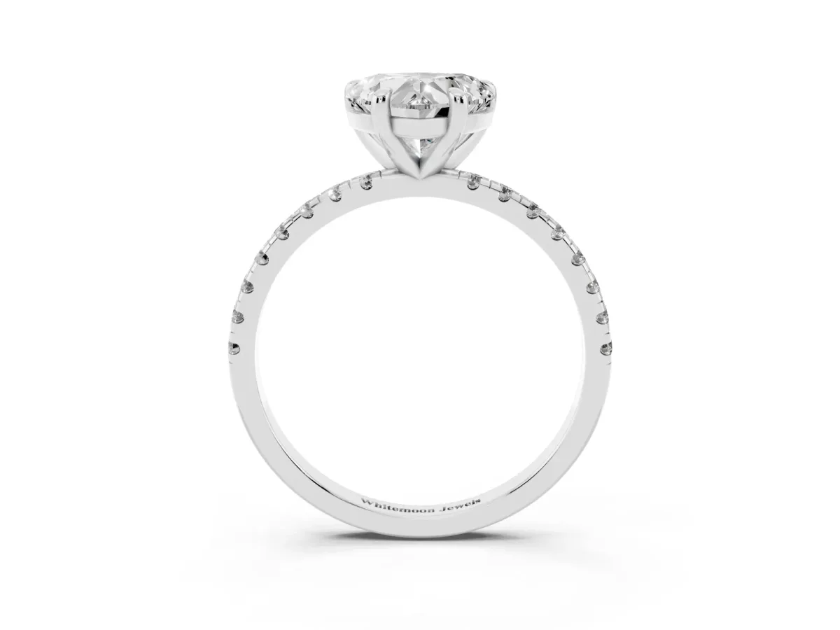 Heart Cut Diamond Brilliant Solitaire Ring with Pavé Band and Four-Prong Setting Silver