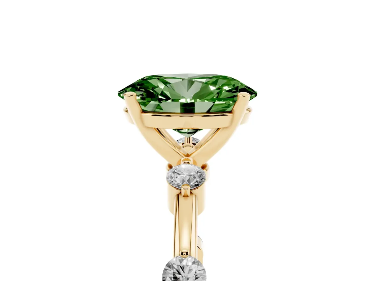 Fancy Green Oval Cut Solitaire Diamond Ring with Bezel Set Side Stones and Prong Setting Yellow gold